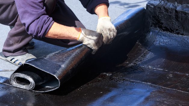 https://www.naki-naki.co.il/wp-content/uploads/2026/09/worker-puts-roofing-material-628x353.jpg